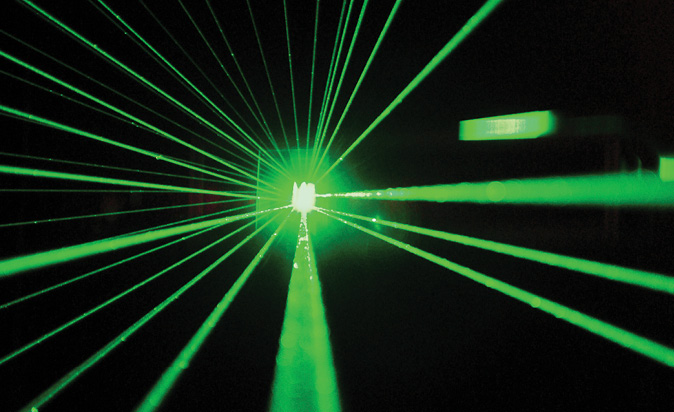Green laser beam that scans a sensor